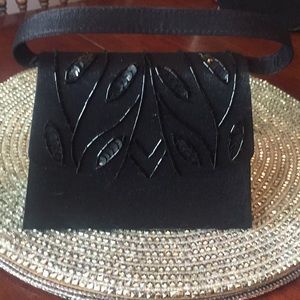 Black satin evening bag with front beading. Unused